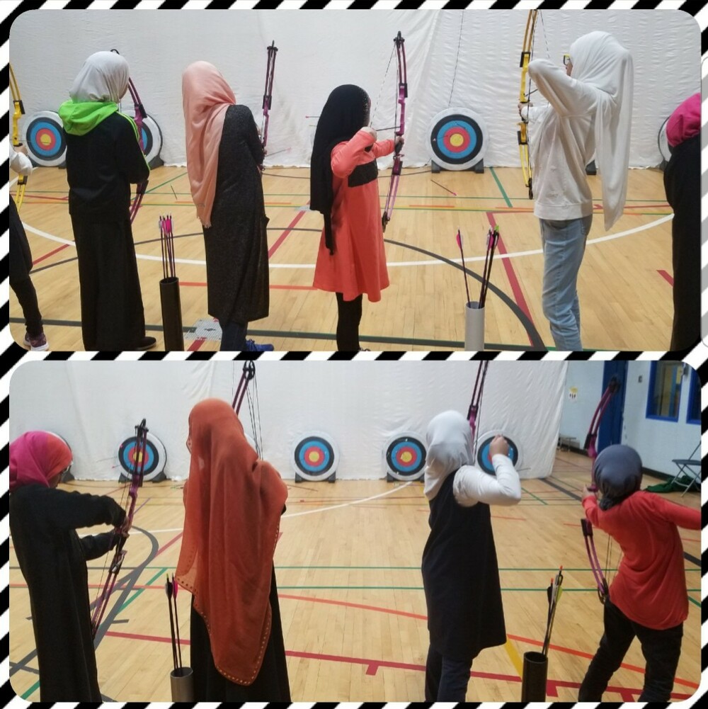 students participating in archery club